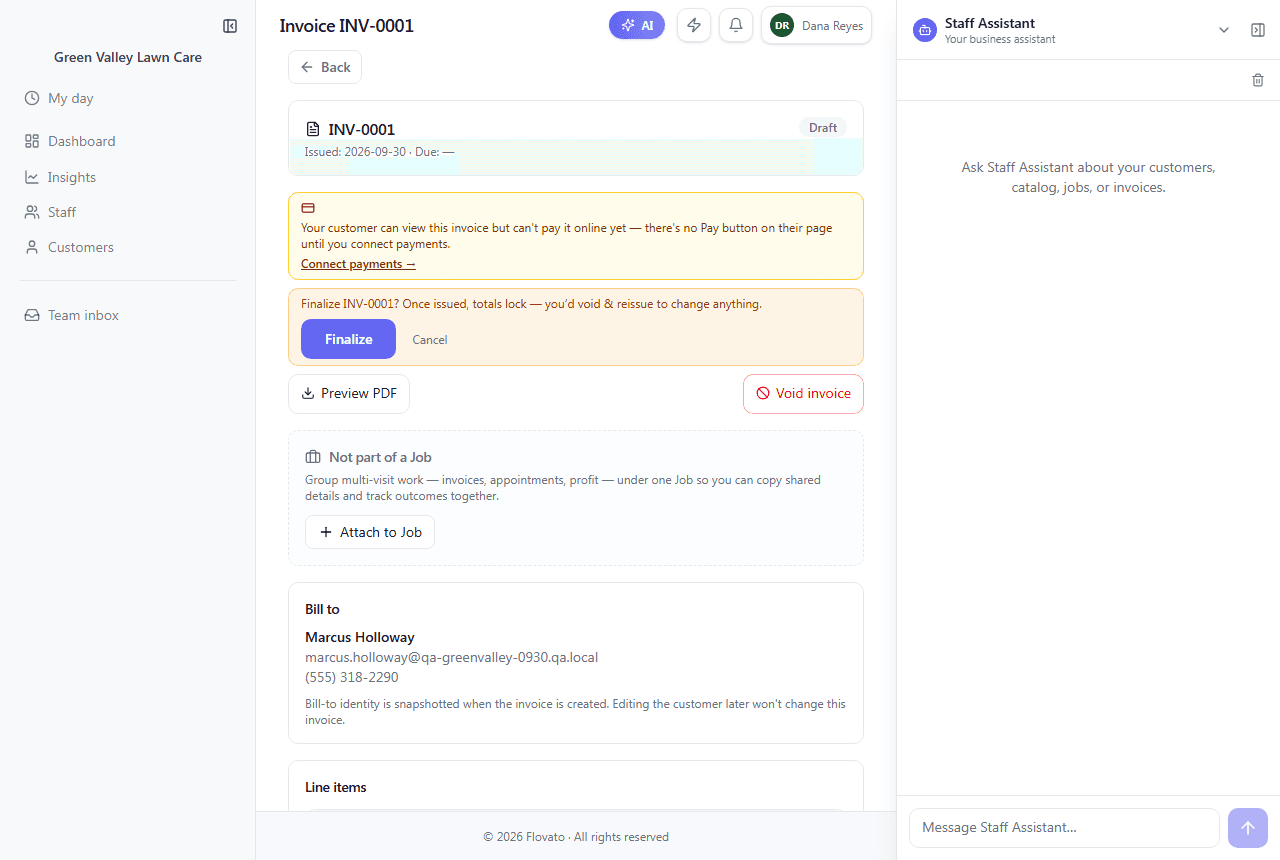 The inline confirmation on a draft invoice warning that totals lock once issued, with Finalize and Cancel buttons